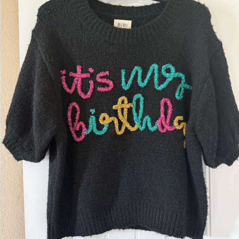BiBi Black Sweater with Pink, Blue, and Yellow Text